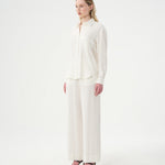 VALERIE C. - Chemise oversized blanche en lin. Côté.