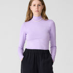 Wide black pants for women with elastic waist. DV. Lilac longsleeve turtleneck for women.