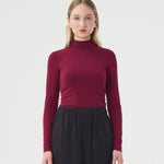 Classique Turtleneck Raisin Bourgogne pour femme. 