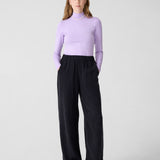 Wide black pants for women with elastic waist. DV. Lilac longsleeve turtleneck for women. 
